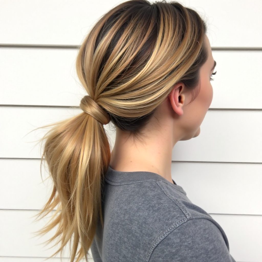 Messy Low Ponytail With A Side Braid